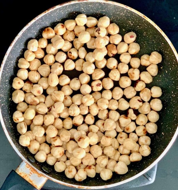 hazelnuts toasted in a pan
