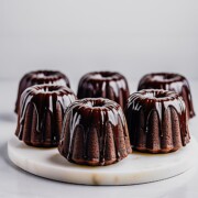 mini bundt chocolate fudge cakes topped with chocolate glaze
